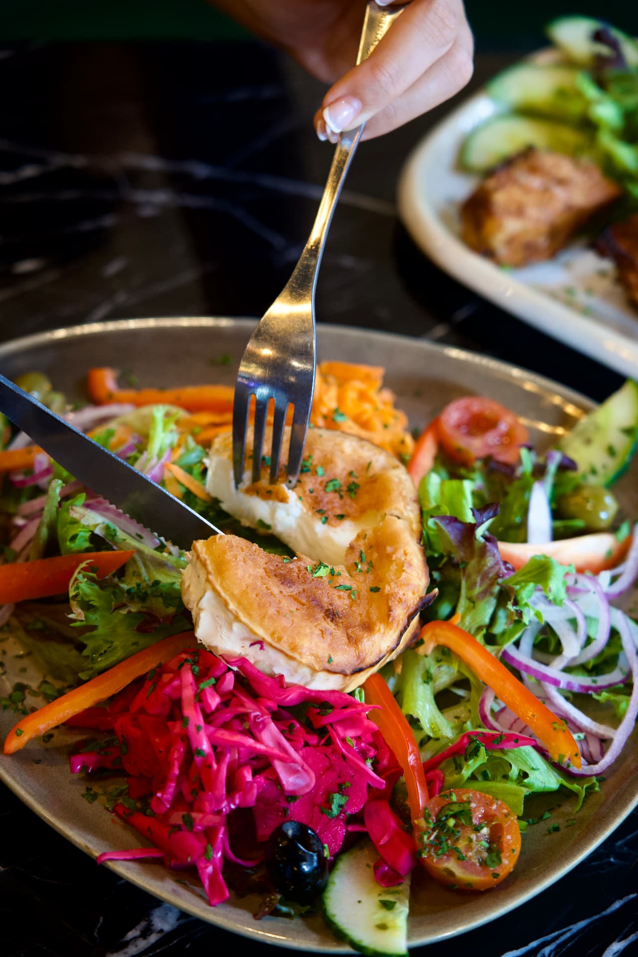 A freshly prepared Nova salad with grilled cheese