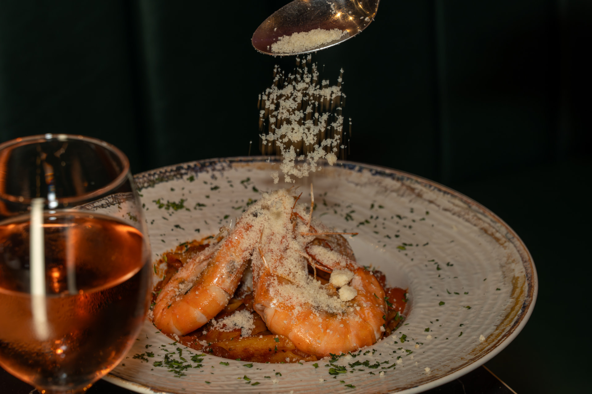 King prawn pasta being finished at Nova