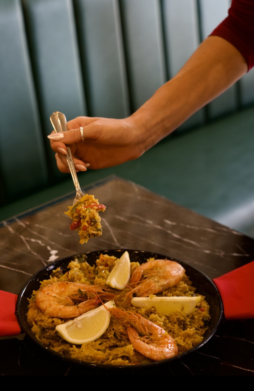 Seafood paella with king prawns and lemon at Nova
